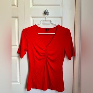 red shirt with mid-sleeves